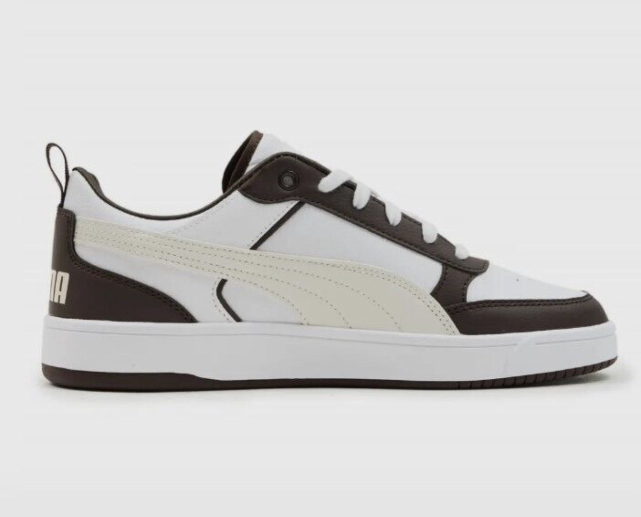 puma  off white and brown shoes.