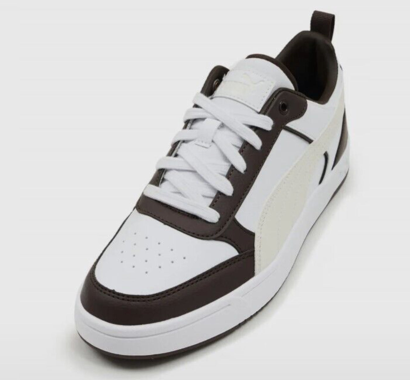 puma  off white and brown shoes.