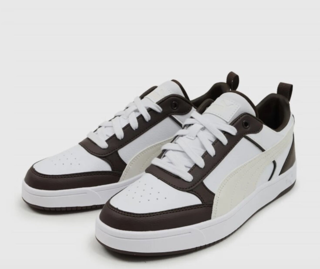 puma  off white and brown shoes.